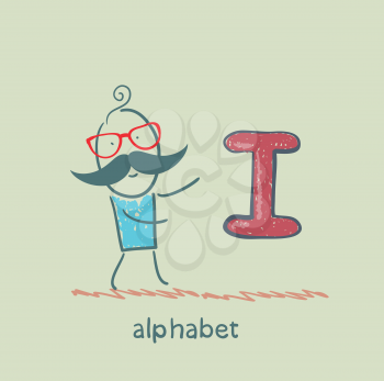 man standing with a letter of the alphabet