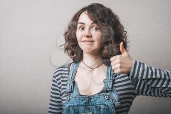 Woman showing thumbs up