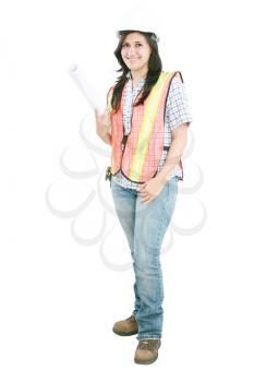 Young architect woman wearing a protective helmet, standing. Isolated on white background 
