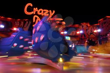 Speedy attraction in amusement park, motion blur