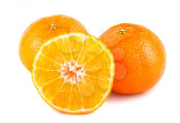 Fresh half and full tangerines isolated on white background