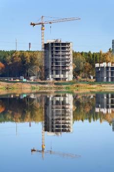 Royalty Free Photo of a Crane and a Buildings