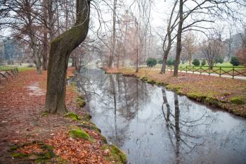 Autumn park with river in Milano, Italy
