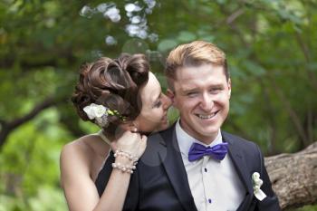 Just married couple kissing, closeup view
