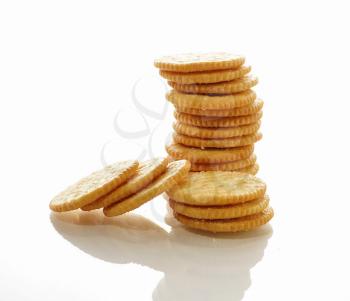 a stack of crackers on white background