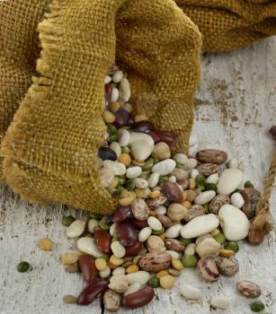 Mix Of Raw Beans In The Burlap Sacks