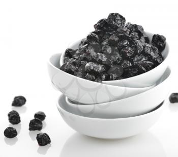 Dried Blueberries In A White Bowl