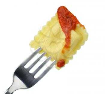 cooked ravioli with tomato sauce on a fork 