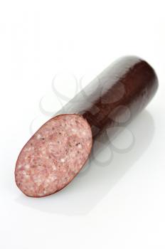  sausage with spices on a white background