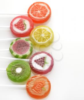 Fruit Lollipops Assortment On White Background 