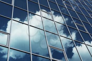 Royalty Free Photo of Clouds Reflecting on Windows