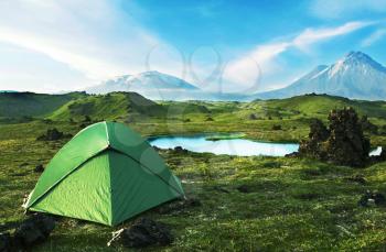 Royalty Free Photo of a Green Tent in Kamchatkian Mountains, Russia