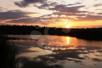 Royalty Free Photo of a Sunrise Over a Lake