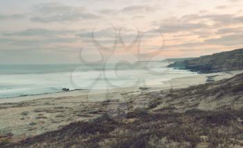 Ocean coast after sunset, Instagram filter.
