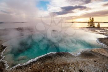 Inspiring natural background. Pools and  geysers  fields  in Yellowstone National Park, USA.