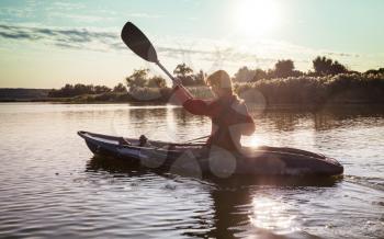 kayaking in river in the summer season