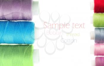 bobbins of thread isolated on white