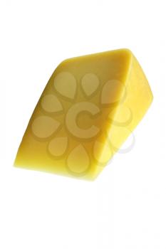 A piece of Swiss cheese isolated on white yellow delicatessen; 