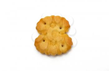 Yellow cookies in the form of figures on a white background