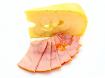 Piece of yellow cheese with a meat piece on a white background