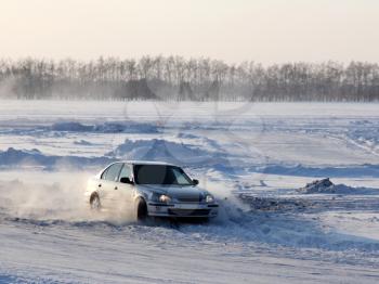 Car on winter road.