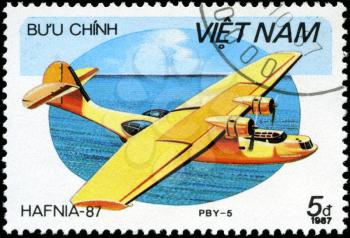 VIETNAV - CIRCA 1987: A stam printed in Vietnam shows amphibian PBY-5, circa 1987