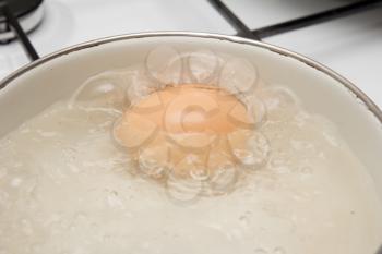 egg is cooked in a pan