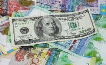 American dollars and Kazakhstan tenge pell-mell 