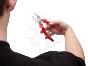 pliers in his hand on a white background