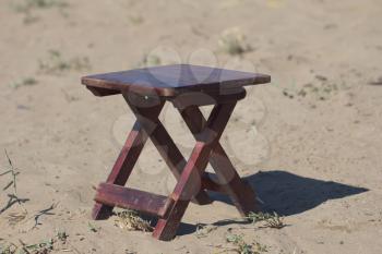 chair stands on the sand