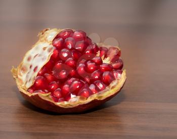 pomegranate on wooden background