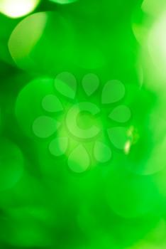 festive green bokeh as background