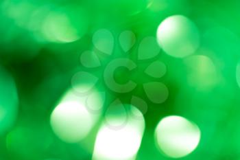 festive green bokeh as background