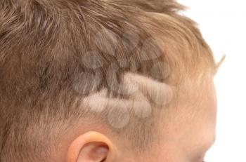 Children's haircut with a picture of lightning