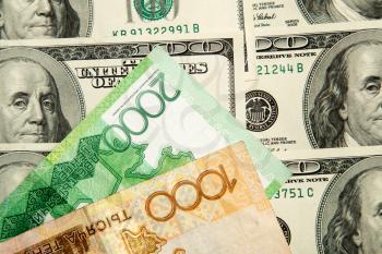 Kazakh tenge and U.S. dollars