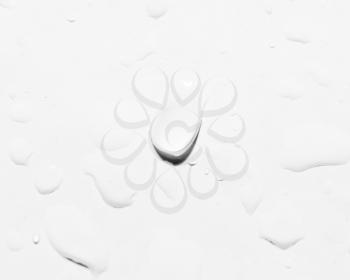 drops of water on white. close-up