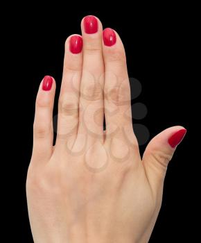 hand with red nail polish on a black background