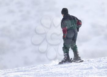 Skier in high mountains