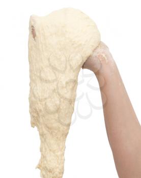 dough in hand on a white background