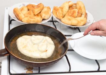 Food patties in a frying pan