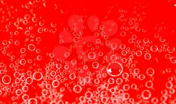 drops of honey on a red background