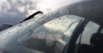 raindrops on a windshield of car