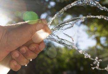 water from the hose outdoors