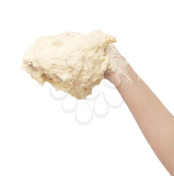 dough in hand on a white background