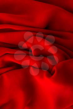 Abstract background of crumpled red silk material