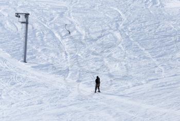 Ski lift in the mountains in winter .