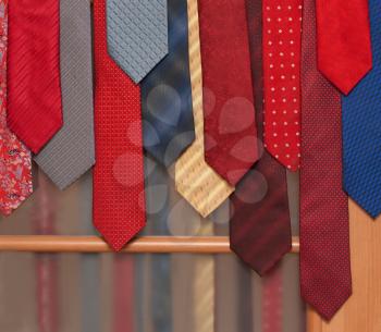 Royalty Free Photo of Neckties Hung on a Door