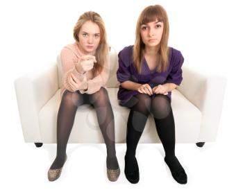 Royalty Free Photo of Two Girls Sitting on a Couch