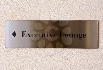 Royalty Free Photo of an Executive Lounge  Sign in a Hotel
