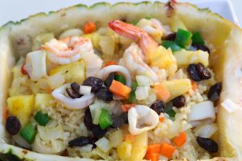 The traditional Thai dish of rice in pineapple with seafood